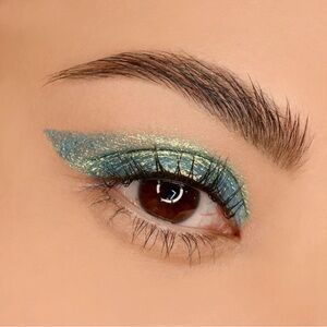 Jeffree Star Another Realm Liquid Star Shadow- blue green w/ gold metallic shift